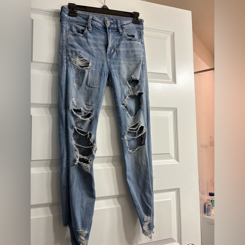 American Eagle Outfitters Light Blue Distressed jeggings 4 short